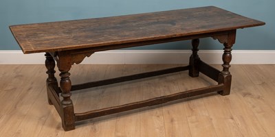 Lot 307 - An old oak refectory table