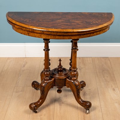 Lot 449 - A Victorian walnut 'D' shaped card table