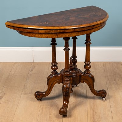 Lot 449 - A Victorian walnut 'D' shaped card table