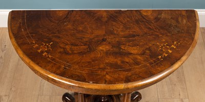 Lot 449 - A Victorian walnut 'D' shaped card table