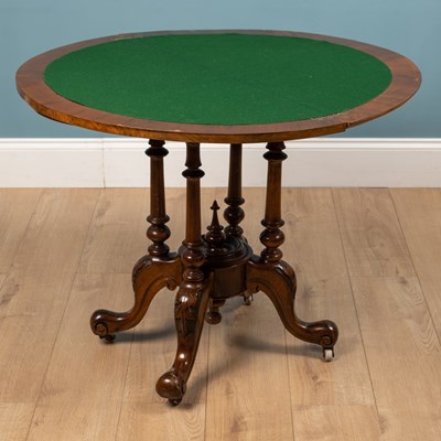 Lot 449 - A Victorian walnut 'D' shaped card table