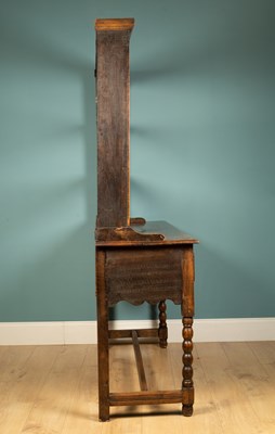 Lot 592 - An antique oak dresser