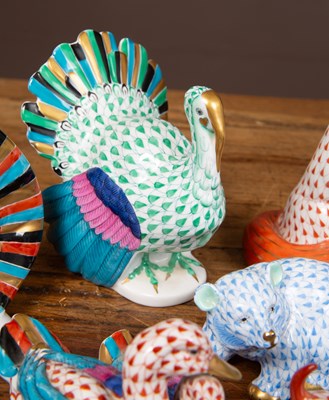 Lot 179 - A collection of twenty five Herend porcelain animals and a heart shaped box