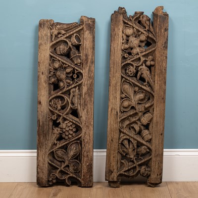 Lot 339 - A pair of English oak carved panels