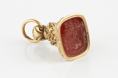 Lot 501 - A 19th century gilt metal fob seal, of shaped...