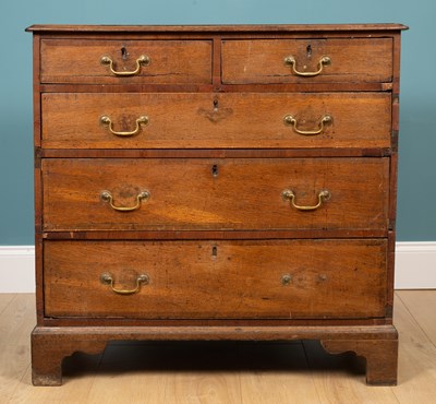 Lot 297 - A George III oak chest of drawers