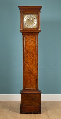 Lot 418 - An 18th century and later walnut long case clock