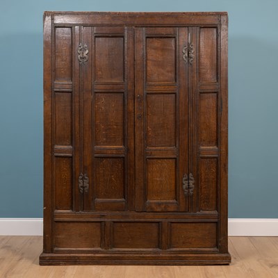 Lot 295 - An antique oak cupboard