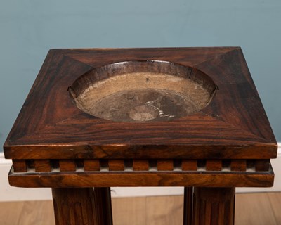 Lot 231 - A Colonial hardwood sculpture stand