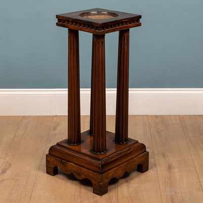 Lot 231 - A Colonial hardwood sculpture stand