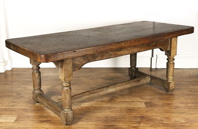 Lot 73 - Solid elm plank top refectory table on turned...