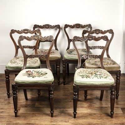 Lot 216 - Set of six rosewood balloon back dining chairs...