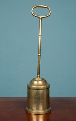 Lot 204 - A 19th century brass door porter or door stop