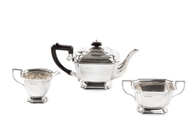 Lot 824 - A George VI silver three piece tea service, of...