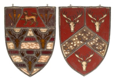 Lot 1090 - A pair of antique leaded stained glass armorial shields