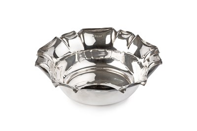 Lot 834 - An Edwardian silver dish, with shaped and...