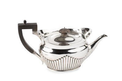 Lot 806 - A late Victorian silver teapot, of oval...