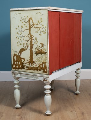 Lot 488 - A cream painted chest of drawers with a marble top