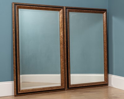 Lot 647 - A pair of contemporary rectangular wall mirrors