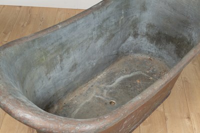 Lot 1179 - An antique 19th century roll top patinated copper bath