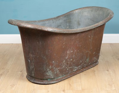 Lot 1179 - An antique 19th century roll top patinated copper bath