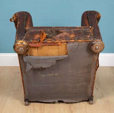 Lot 317 - A 19th century leather wingback armchair