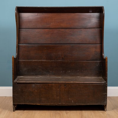 Lot 279 - A 19th century elm high-backed settle