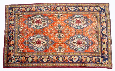Lot 152 - A Middle Eastern Sarough red ground rug