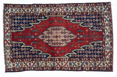 Lot 1063 - An antique Mazlagan red and blue ground rug