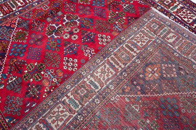 Lot 1069 - A Middle Eastern Meimeh red ground rug
