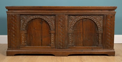 Lot 329 - An antique oak coffer