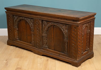 Lot 329 - An antique oak coffer