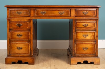 Lot 330 - A hardwood pedestal desk by Brights of Nettlebed