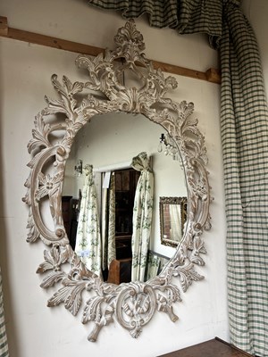 Lot 169 - A large Rococo style wall mirror