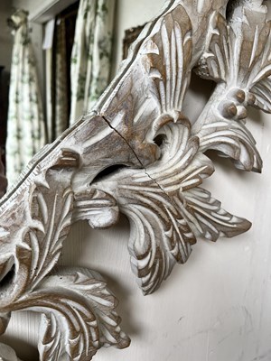 Lot 169 - A large Rococo style wall mirror
