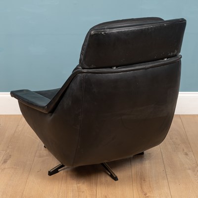 Lot 580 - A vintage black leather late 20th century armchair