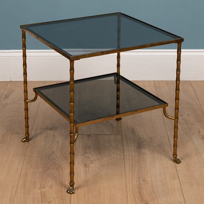 Lot 404 - A mid to late 20th century continental gilt brass two tier occasional table