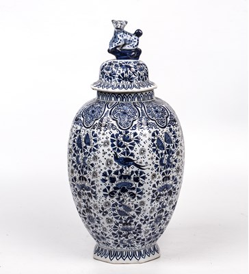 Lot 112 - An antique Dutch Delft blue and white vase and...
