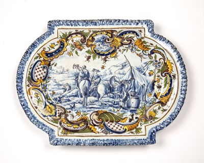 Lot 118 - A 19th century French tin glazed platter with...