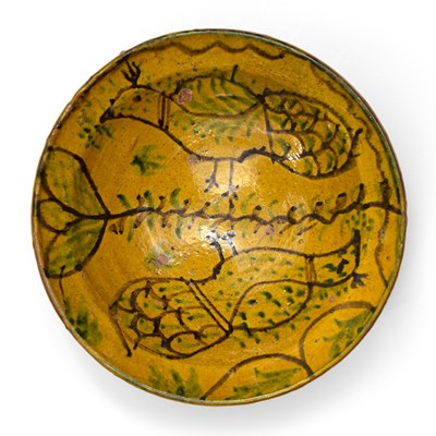 Lot 119 - A 19th century north African slipware bowl...