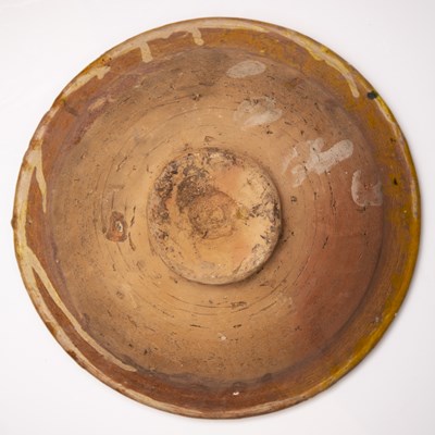 Lot 119 - A 19th century north African slipware bowl...