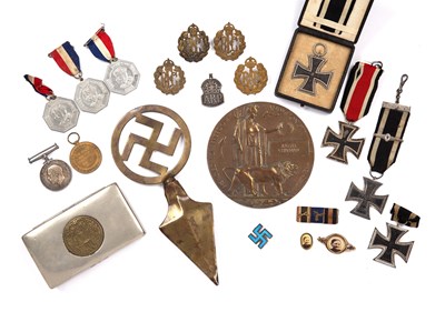 Lot 164 - A group of military medals and badges to...