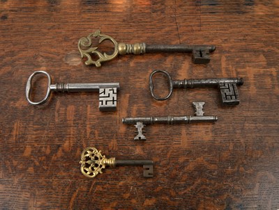 Lot 332 - Collection of five keys including brass and...