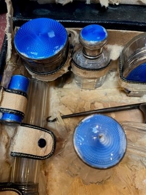 Lot 176 - A silver and blue enamel dressing table set,...