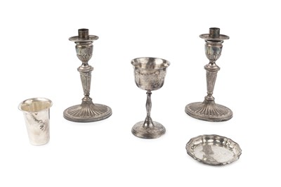 Lot 820 - A pair of silver candlesticks, with fluted...