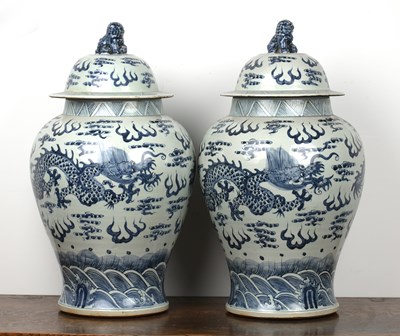 Lot 350 - Pair of blue and white large vases and covers...