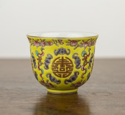 Lot 129 - Yellow enamel painted tea bowl Chinese, 19th...