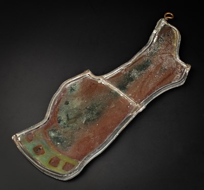 Lot 1150 - An antique stained glass window fragment