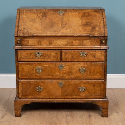 Lot 261 - An early 18th century walnut bureau