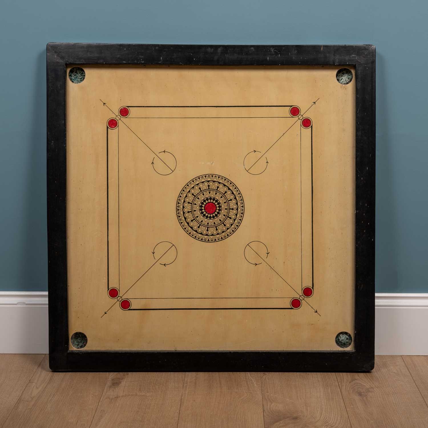 Lot 264 - A carrom board and pieces